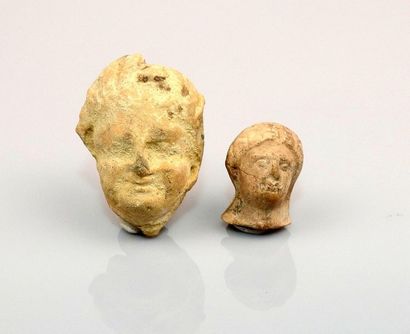 Batch of two male faces

Terracotta 2.7 and...