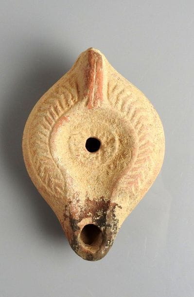 Oil lamp with geometric decoration and elongated...