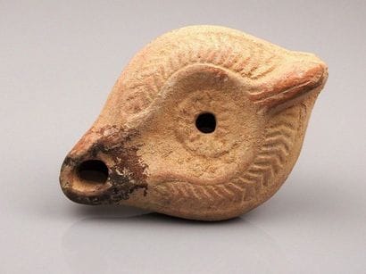 Oil lamp with geometric decoration and elongated...