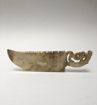 Pale yellow jade ritual knife with curved...