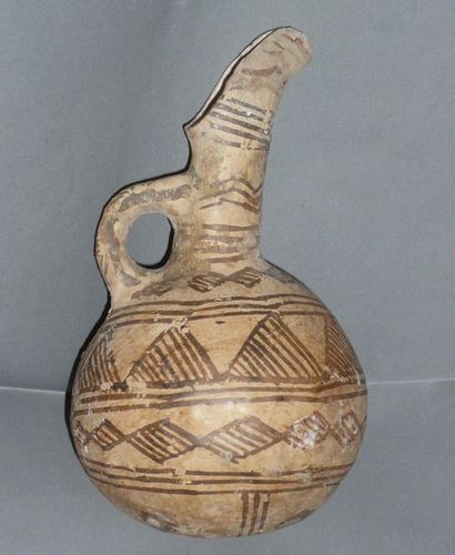 Beige terracotta ovoid jug decorated with...