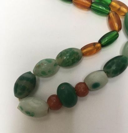 Necklace in glassware made of round or ovoid...