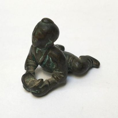 Oxidized bronze scribe weights. It represents...