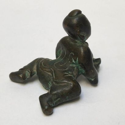 Oxidized bronze scribe weights. It represents...