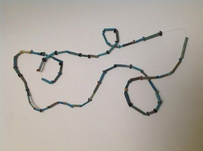 Mummy necklace made of tubular blue frit...