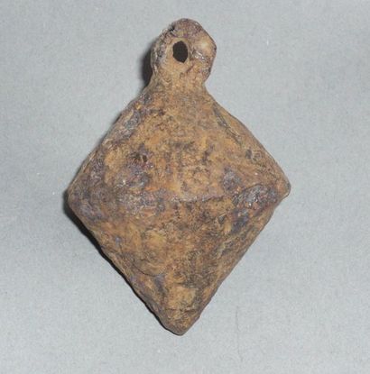 Iron plumb bob in the shape of a spinning...