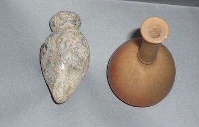 Lead plumb bob from the Roman period.

H:...