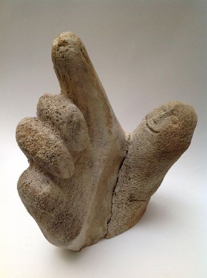 Curious hand carved in a cetacean bone. A...