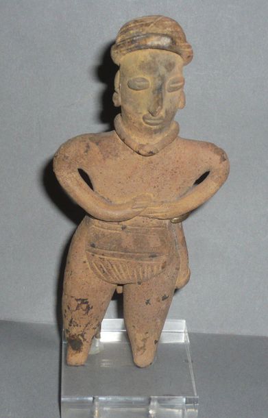 Standing character, he wears a braided loincloth,...