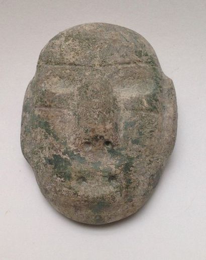 Cult mask made of green aquatic coloured...