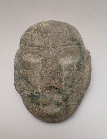 Cult mask made of green aquatic coloured...