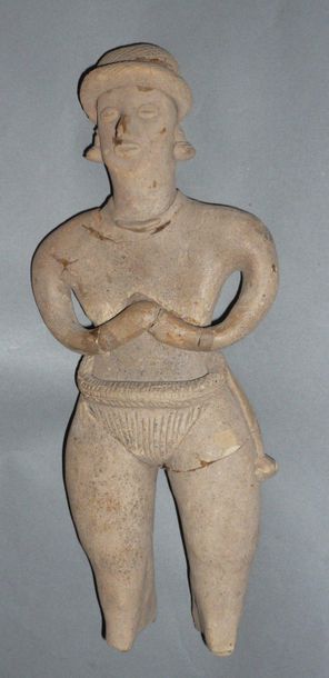 Standing figure wearing a braided loincloth...