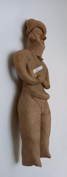 Standing figure wearing a braided loincloth...