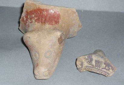 Lot: a painted terracotta animal foot from...