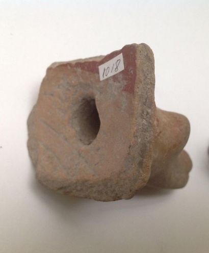Lot: a painted terracotta animal foot from...