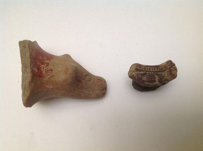 Lot: a painted terracotta animal foot from...