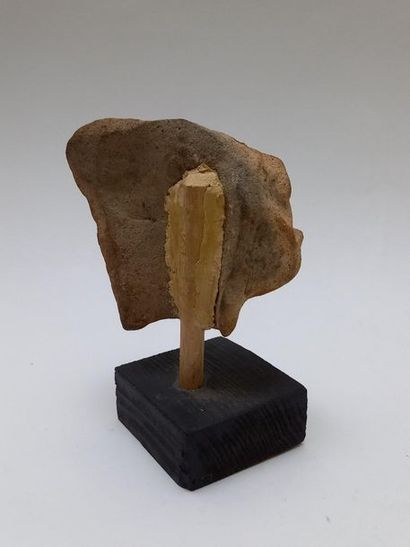 Beige terracotta fragmentary head probably...