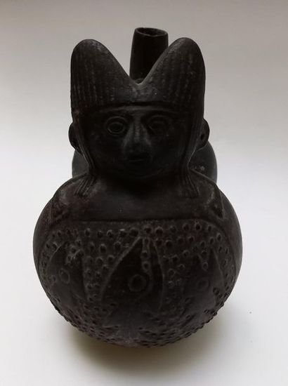 Double-bellied black ceramic stirrup vase....