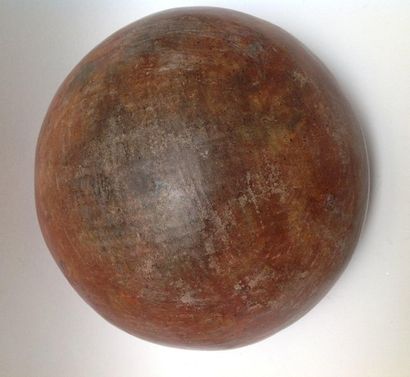 Lenticular terracotta vase painted red ochre....