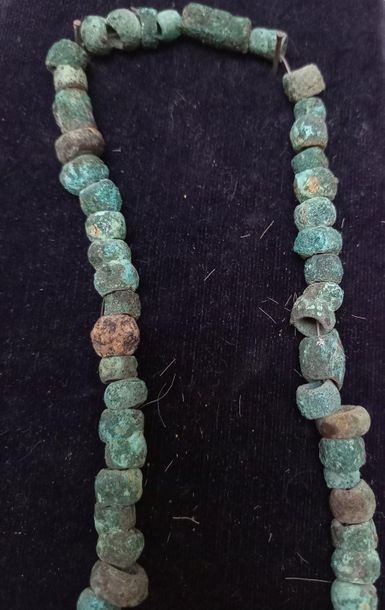 Necklace composed of bronze beads decorated...