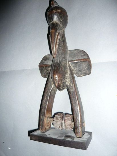 Beautiful hardwood loom pulley bracket representing...