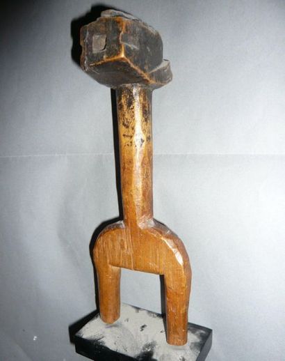 Ancient hammer-shaped stone thrower. The...