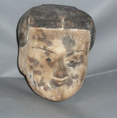 Black terracotta concubine head with slip.

Han...
