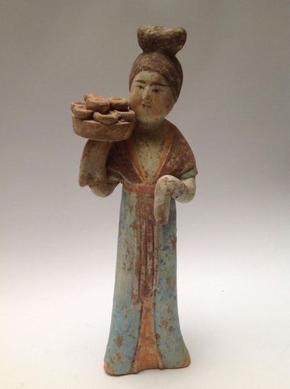 Pinkish terracotta offering carrier with...