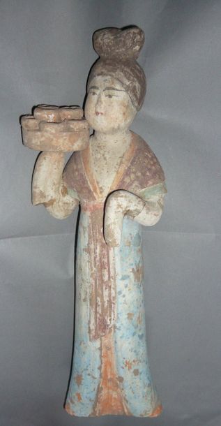 Pinkish terracotta offering carrier with...
