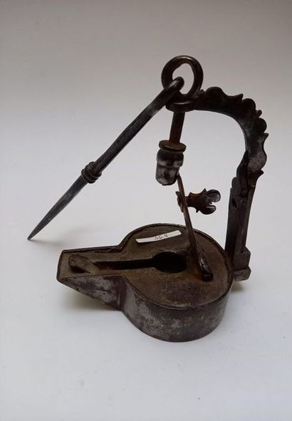 Iron oil lamp and its hanger. Probably medieval....