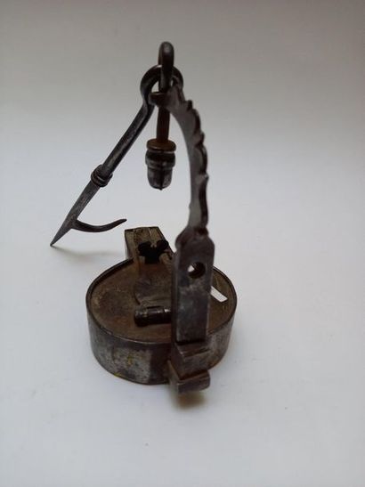 Iron oil lamp and its hanger. Probably medieval....