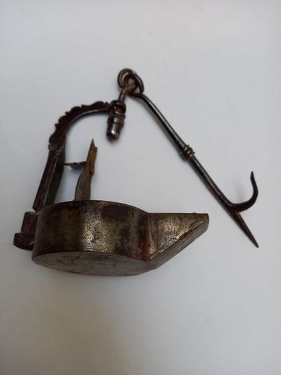 Iron oil lamp and its hanger. Probably medieval....