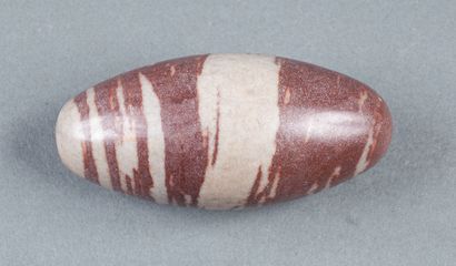 Lingam in beige and reddish stone

10.5x...