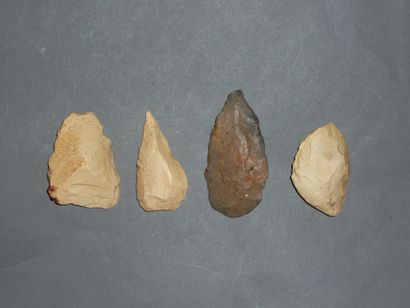 Four large blonde flint arrowheads. Neolithic....