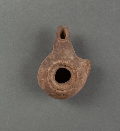 Grey terracotta oil lamp. 

Punic period....