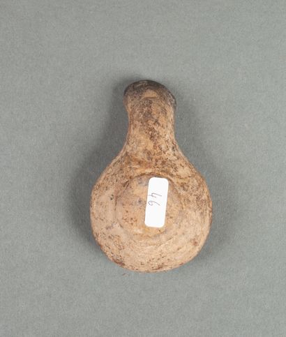 Oil lamp in brown terracotta with traces...