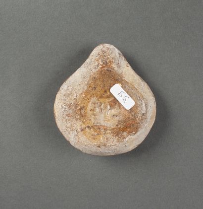 White terracotta oil lamp of the 