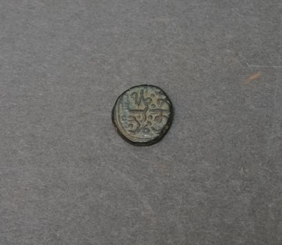 Monnaie ancienne en bronze. Maghreb

D: ...