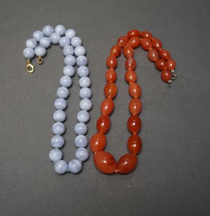 Set of two necklaces with round and oval...