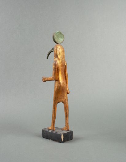 Statuette dorée représentant le Dieu Thot...