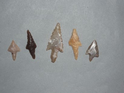 Set of five Neolithic flint arrowheads with...