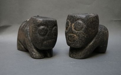 Pair of anthropomorphic black stone offering...