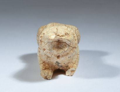 Lion couché en ivoire

Perse, Ier millénaire...