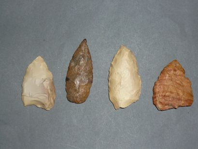 Four large blonde flint arrowheads. Neolithic....