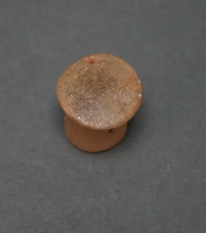 Rock crystal labret in the shape of a pawn....