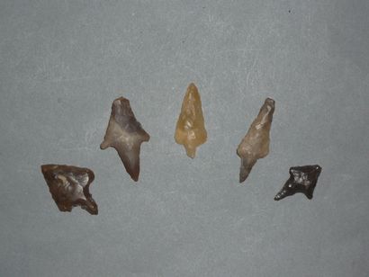 Set of five Neolithic flint arrowheads with...