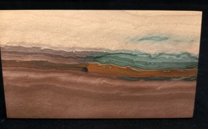 
Lithographic plate of a sunset landscape....