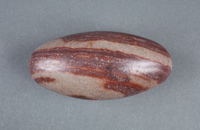 Lingam in beige and reddish stone

12.5x...