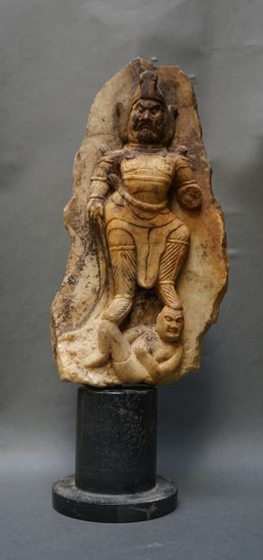 Lokapala in white stone. H: 31cm