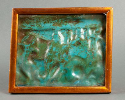A deep blue earthenware tile depicting an...